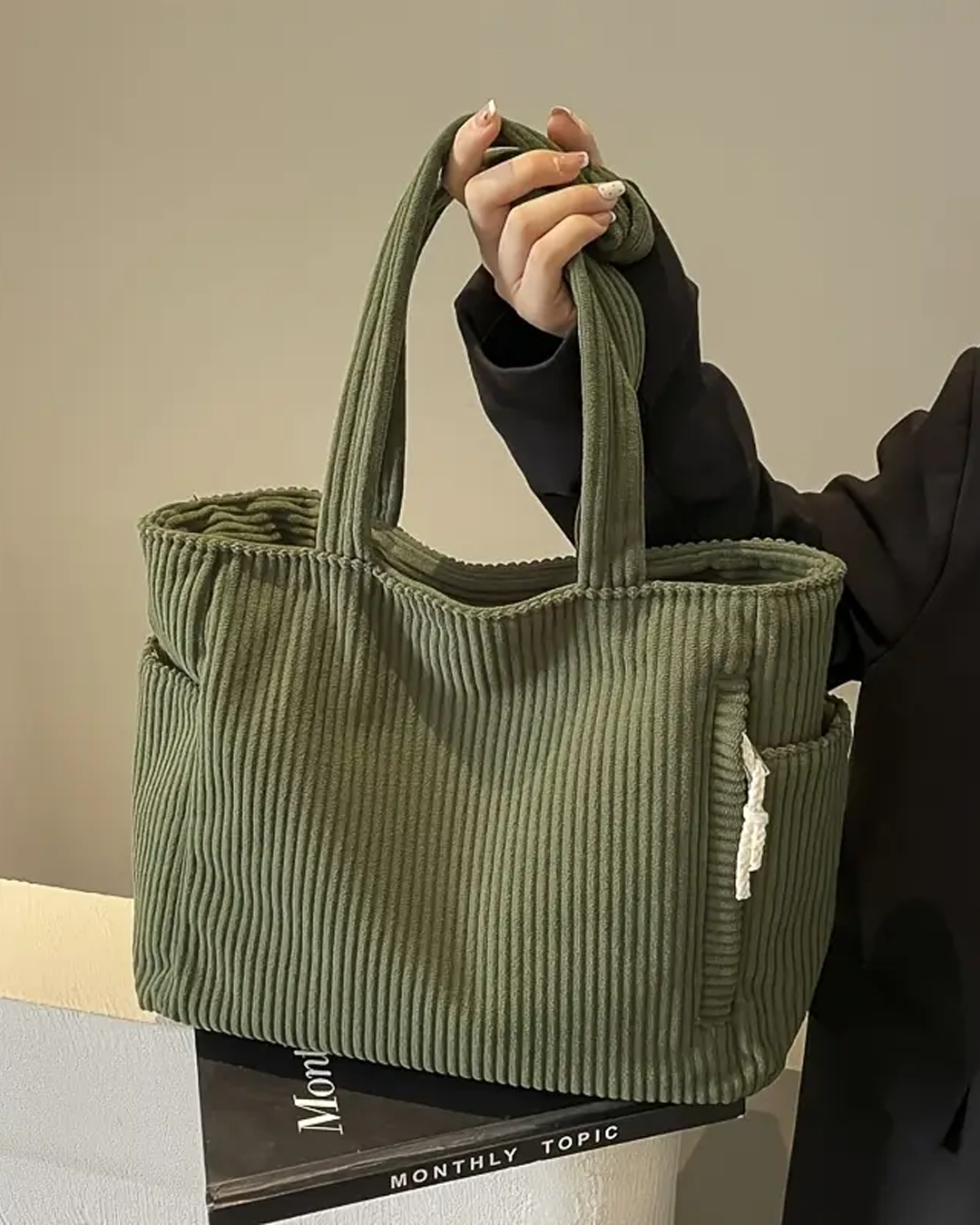 TILDA | BOLSO DE MANO ACANALADO CON DETALLE DE CORDÓN