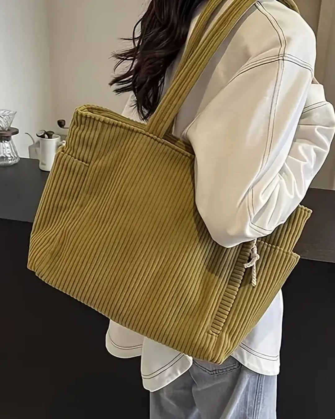 TILDA | BOLSO DE MANO ACANALADO CON DETALLE DE CORDÓN