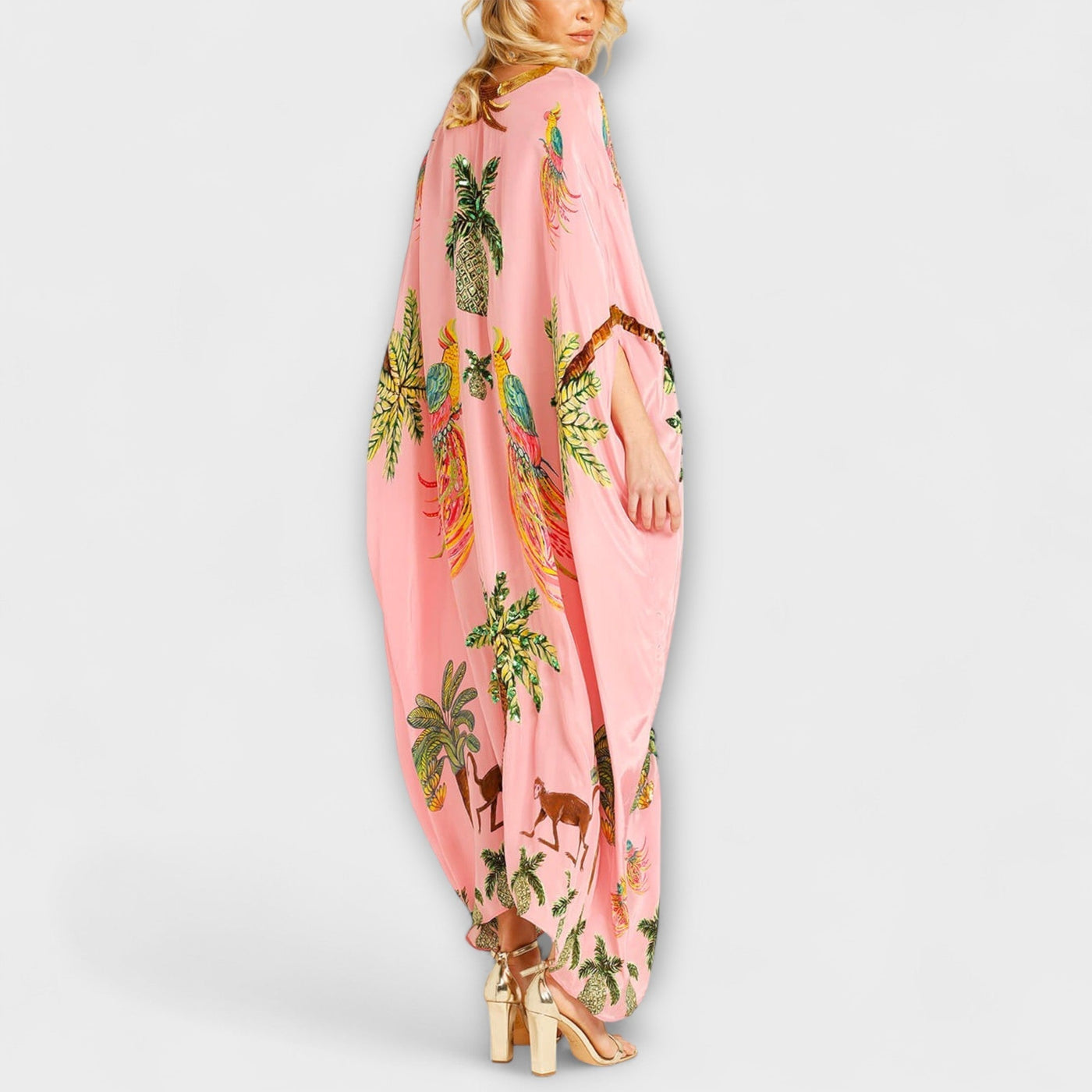 Linda - Vestido llamativo con hombros asimétricos y estampado de palmera