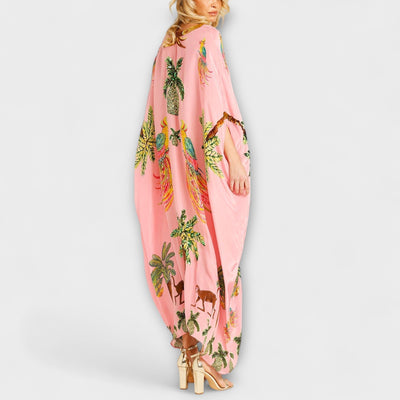 Linda - Vestido llamativo con hombros asimétricos y estampado de palmera