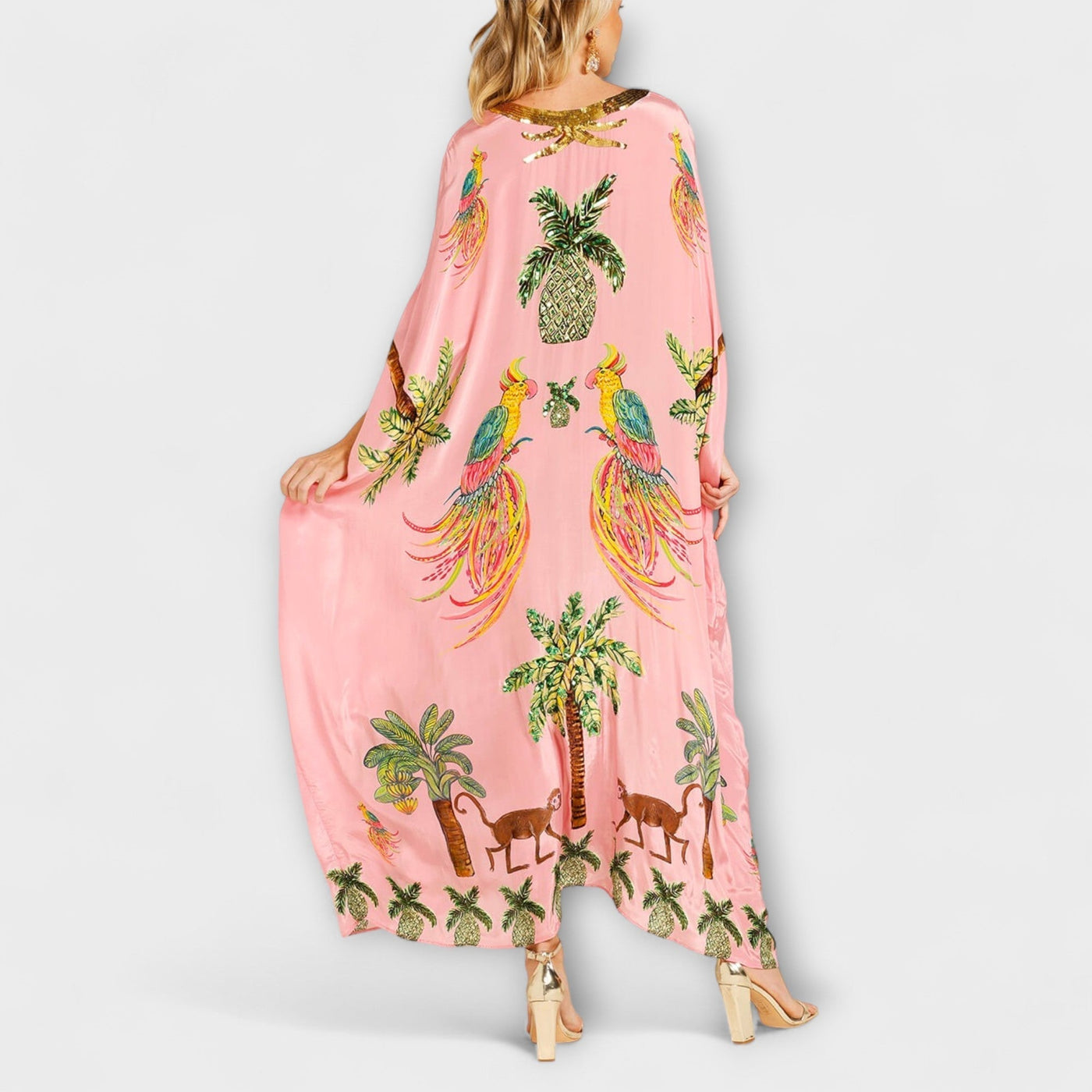 Linda - Vestido llamativo con hombros asimétricos y estampado de palmera